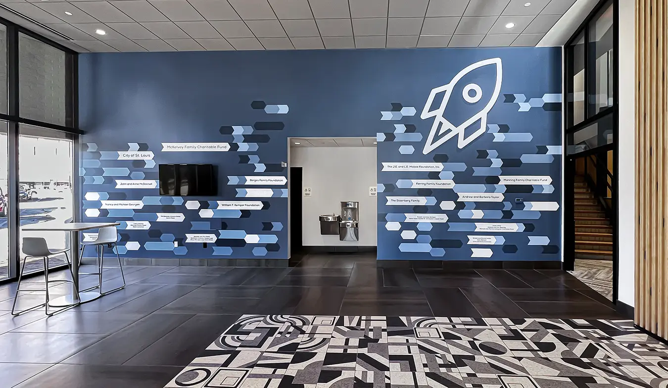 Environmental branding with artistic wall decor workplace design