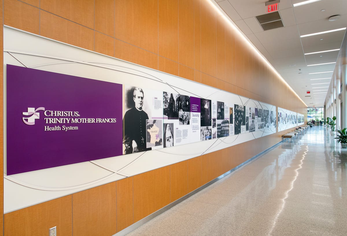 Custom history timeline wall at CHRISTUS Mother Frances Hospital